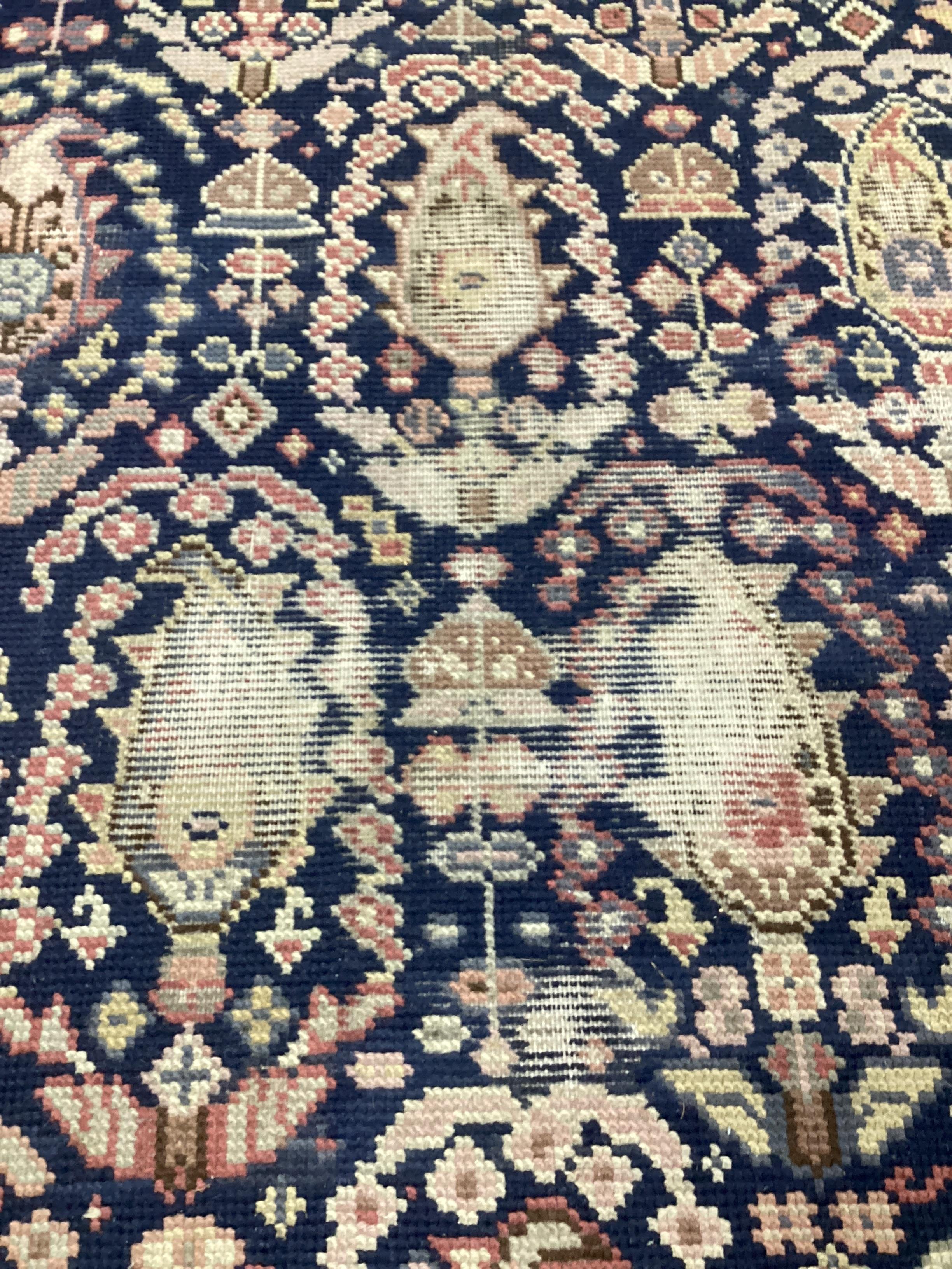 A North West Persian ivory ground rug, a Kuba blue ground rug and a Karabagh type Boteh rug, largest 210 x 136cm